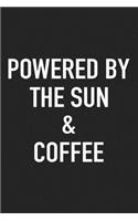 Powered by Sun and Coffee: A 6x9 Inch Matte Softcover Journal Notebook with 120 Blank Lined Pages and a Funny Caffeine Loving Cover Slogan