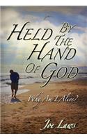 Held by the Hand of God