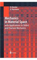 Mechanics in Material Space