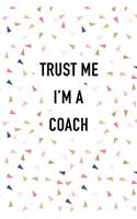 Trust Me I'm a Coach: A 6x9 Inch Matte Softcover Journal Notebook with 120 Blank Lined Pages and a Funny Sports Loving Cover Slogan