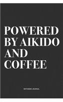 Powered By Aikido And Coffee: A 6x9 Inch Notebook Journal Diary With A Bold Text Font Slogan On A Matte Cover and 120 Blank Lined Pages Makes A Great Alternative To A Card