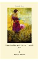 Il vento si incapriccia tra i capelli
