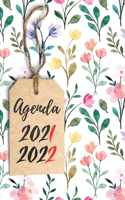 Agenda Scolaire 2021-2022 Ado Fille: Pour collègienne et lycéenne / Semainier sur 2 pages côte à côte / début Août 2021 à fin Août 2022 / Fleur pattern