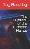 The Mystery of the Clasped Hands
