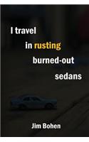 I travel in rusting burned-out sedans