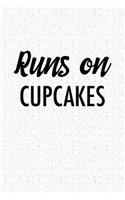 Runs on Cupcakes: A 6x9 Inch Matte Softcover Notebook Journal with 120 Blank Lined Pages and a Funny Foodie Cover Slogan