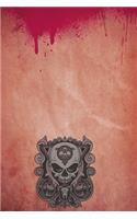 Bloody dirty curly skull on paper notebook