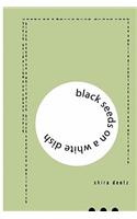 Black Seeds on a White Dish
