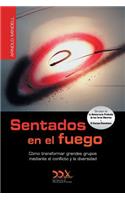Sentados en el fuego