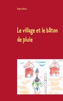 village et le bâton de pluie