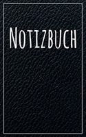 Notizbuch: Notizbuch A5 120 Seiten kariert und schwarzer Leder Optik (Softcover, glänzend).