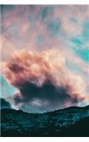 Dramatic Pink Clouds Over the Mountains at Sunset Journal: 150 Page Lined Notebook/Diary