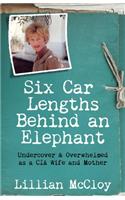 Six Car Lengths Behind an Elephant