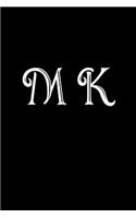 M K