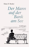 Mann auf der Bank am See