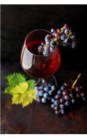 A Glass of Red Wine and Grapes Journal: 150 Page Lined Notebook/Diary