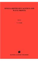 Singularities of Caustics and Wave Fronts