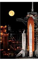 The Space Shuttle Discovery and Moonlight Journal