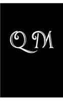 Q M