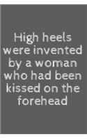 High heels were invented by a woman who had been kissed on the forehead - Blank Lined Journal Funny notebook