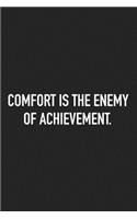 Comfort Is the Enemy of Achievement: A 6x9 Inch Matte Softcover Journal Notebook with 120 Blank Lined Pages and an Uplifting and Motivational Cover Slogan