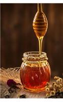 Golden Honey Falling from a Wooden Dipper Journal: 150 Page Lined Notebook/Diary