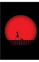 Girl Followed By Cat Against a Red Moon Journal: 150 page lined notebook/diary
