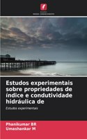 Estudos experimentais sobre propriedades de índice e condutividade hidráulica de