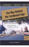 The Man Behind the Cardboard Sign