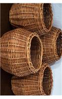A Collection of 4 Wicker Baskets Journal