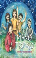 la mano traigo
