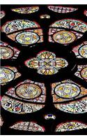 A View of a Colorful Stained Glass Windows in a Church Art Journal