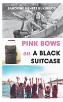 Pink Bows on a Black Suitcase