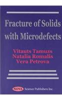 Fracture of Solids with Microdefects