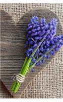 Grape Hyacinth Flowers on a Wooden Heart Journal: 150 Page Lined Notebook/Diary