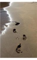 Footprints on a Sandy Beach Journal: 150 page lined notebook/diary