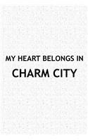 My Heart Belongs in Charm City: A 6x9 Inch Matte Softcover Journal Notebook with 120 Blank Lined Pages and a Positive Hometown or Travel Cover Slogan