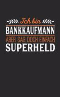 Ich bin Bankkaufmann aber sag doch einfach Superheld: Notizbuch A5 dotgrid gepunktet 120 Seiten, Notizheft / Tagebuch / Reise Journal, perfektes Geschenk für jeden Bankkaufmann