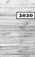 2020: Tagesplaner Kalender. Terminkalender zum Planen, Notieren und Organisieren. Motiv: Holz - Urlaub