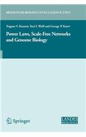 Power Laws, Scale-Free Networks and Genome Biology