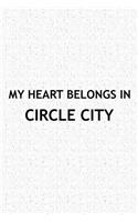 My Heart Belongs in Circle City: A 6x9 Inch Matte Softcover Journal Notebook with 120 Blank Lined Pages and a Positive Hometown or Travel Cover Slogan