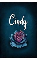 Cindy: Personalized Name Journal, Lined Notebook with Beautiful Rose Illustration on Blue Cover
