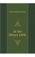 At the library table