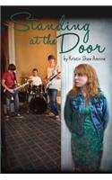 Standing at the Door