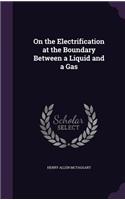 On the Electrification at the Boundary Between a Liquid and a Gas