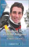 Snowed in with the Surgeon: A Christmas Romance Novel
