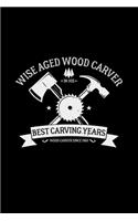 Wise aged wood carver in his best carving years