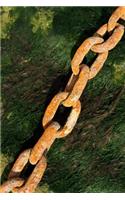 Rusty Boat Anchor Chain and Seaweed