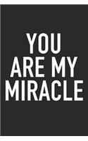 You Are My Miracle: A 6x9 Inch Matte Softcover Journal Notebook with 120 Blank Lined Pages and an Uplifting Positive and Motivaitonal Cover Slogan