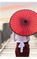 A Woman With a Red Parasol Walking on a Pier in Myanmar Journal: 150 Page Lined Notebook/Diary